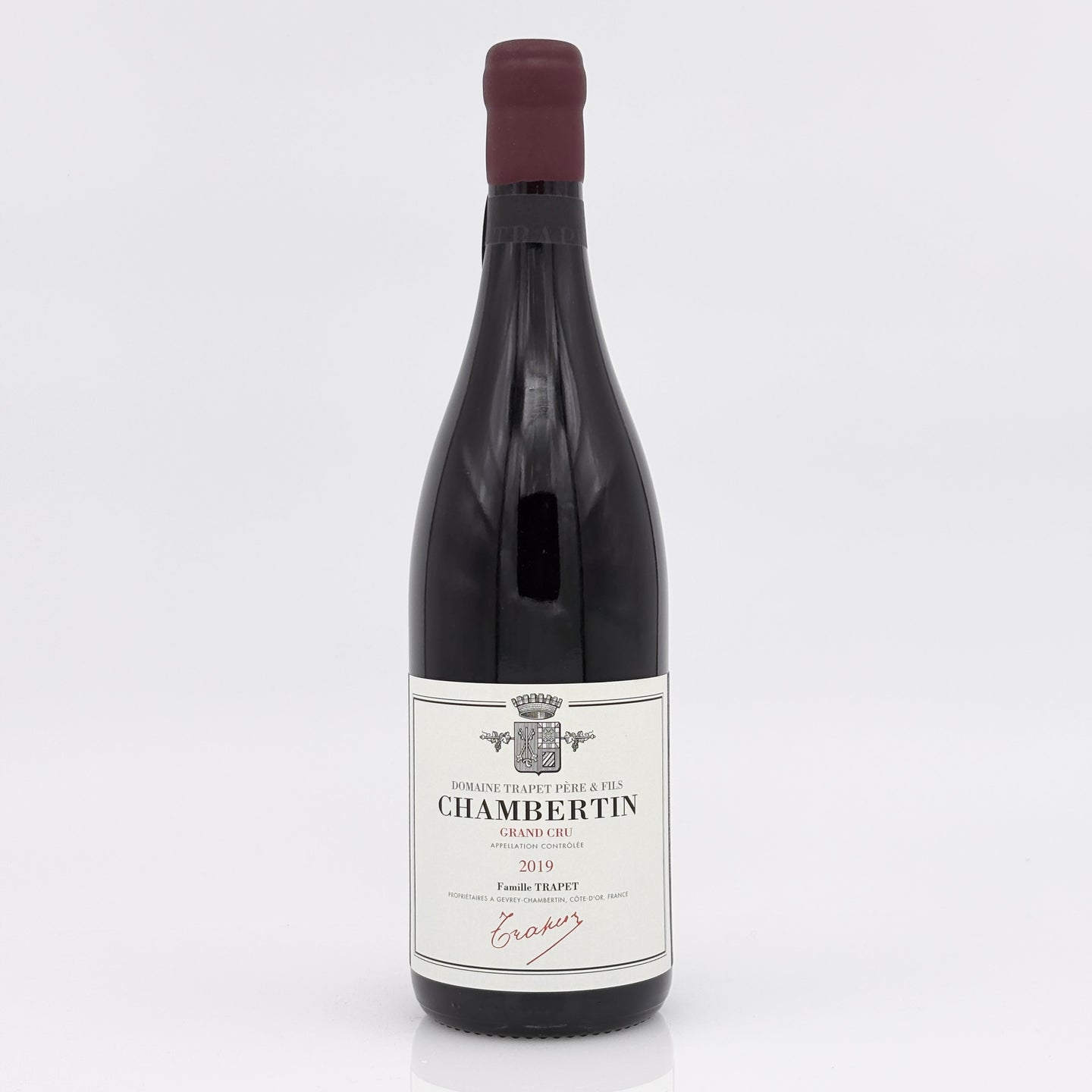 Wine bottle labeled 'Chambertin' on a white background