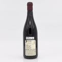 Wine bottle with a label on a white background