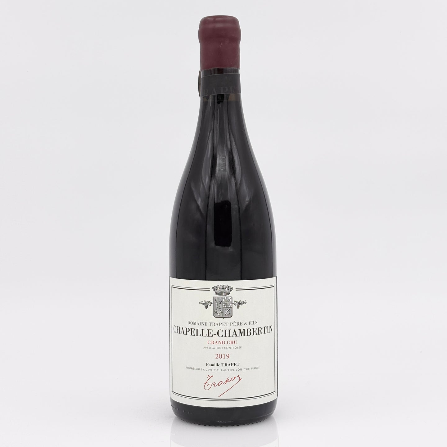Wine bottle with label on a white background