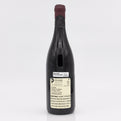 Wine bottle with a label on a white background
