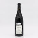 Wine bottle with a label on a white background