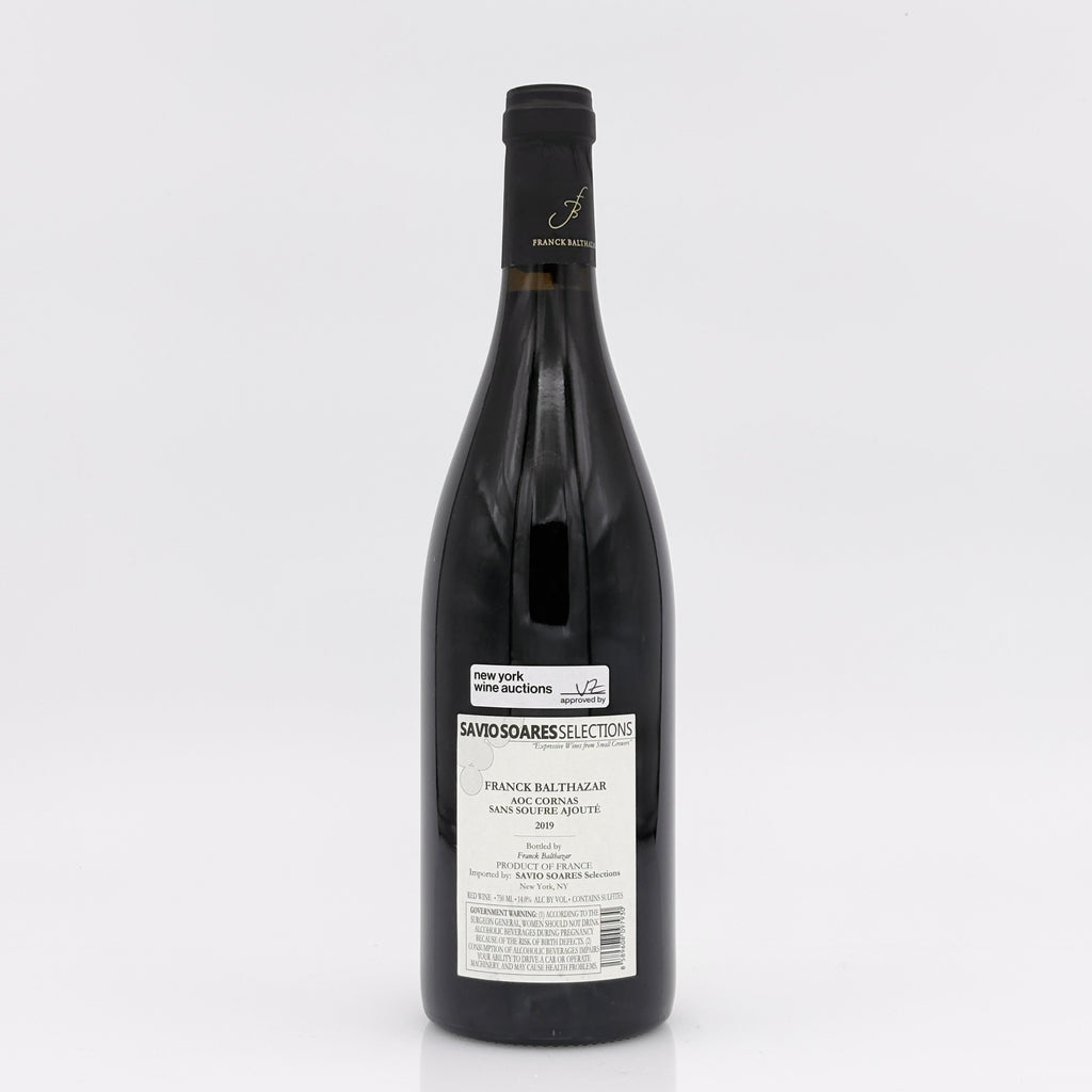 Wine bottle with a label on a white background