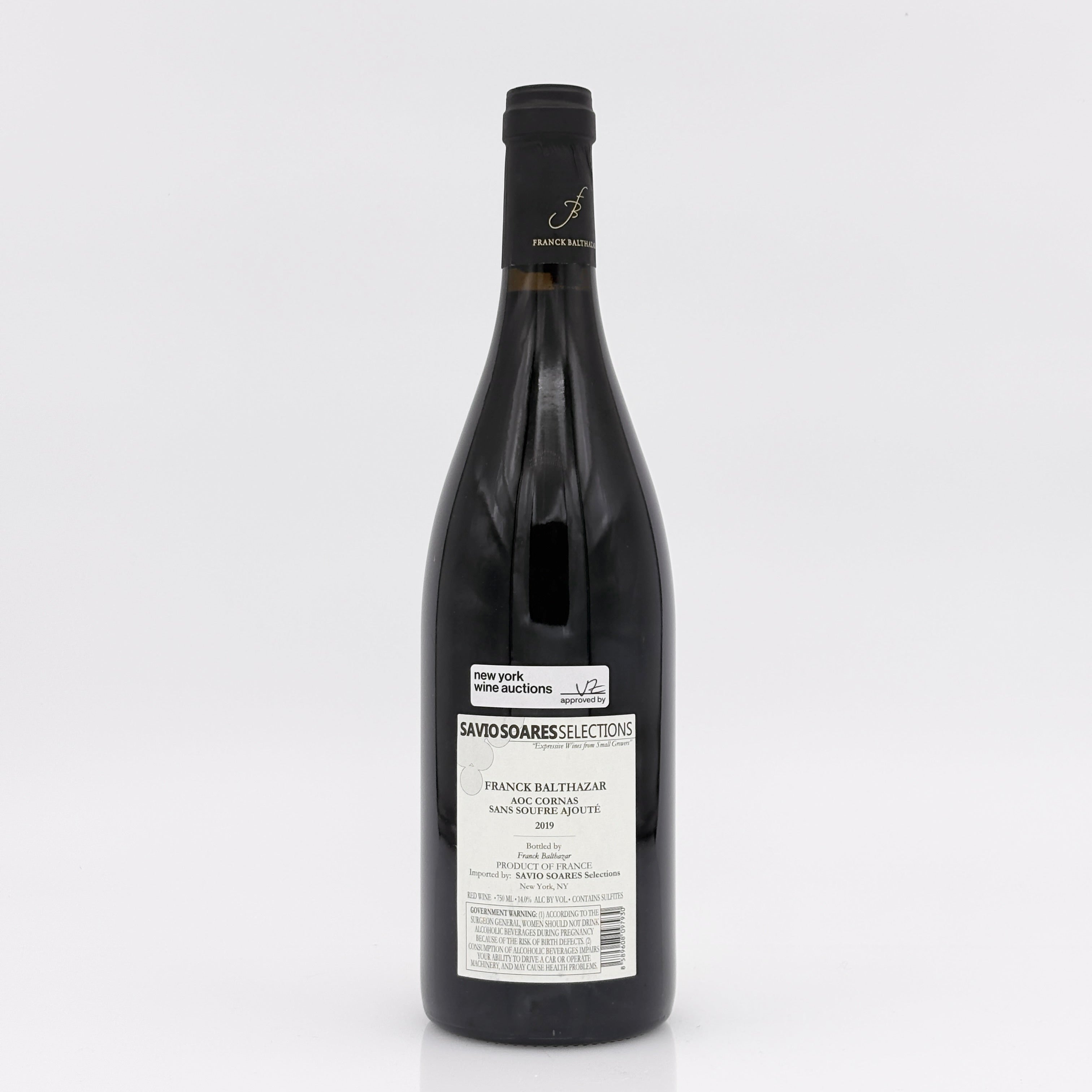 Wine bottle with a label on a white background