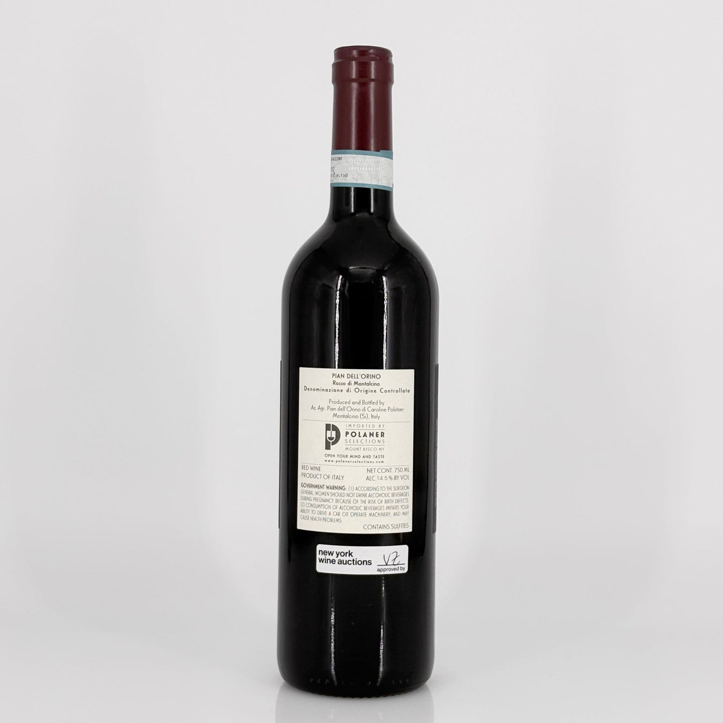 Red wine bottle with a label on a white background