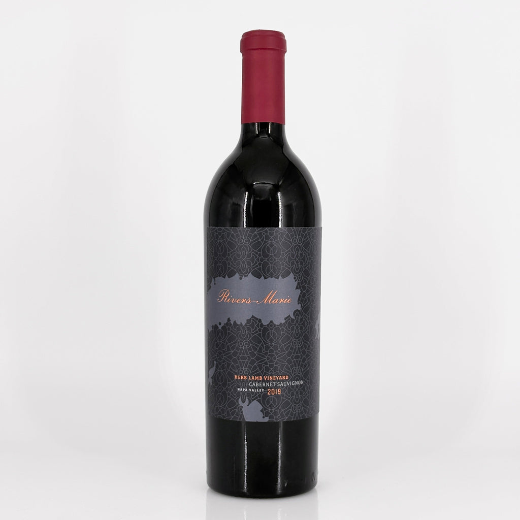 Red wine bottle with a dark label on a light gray background