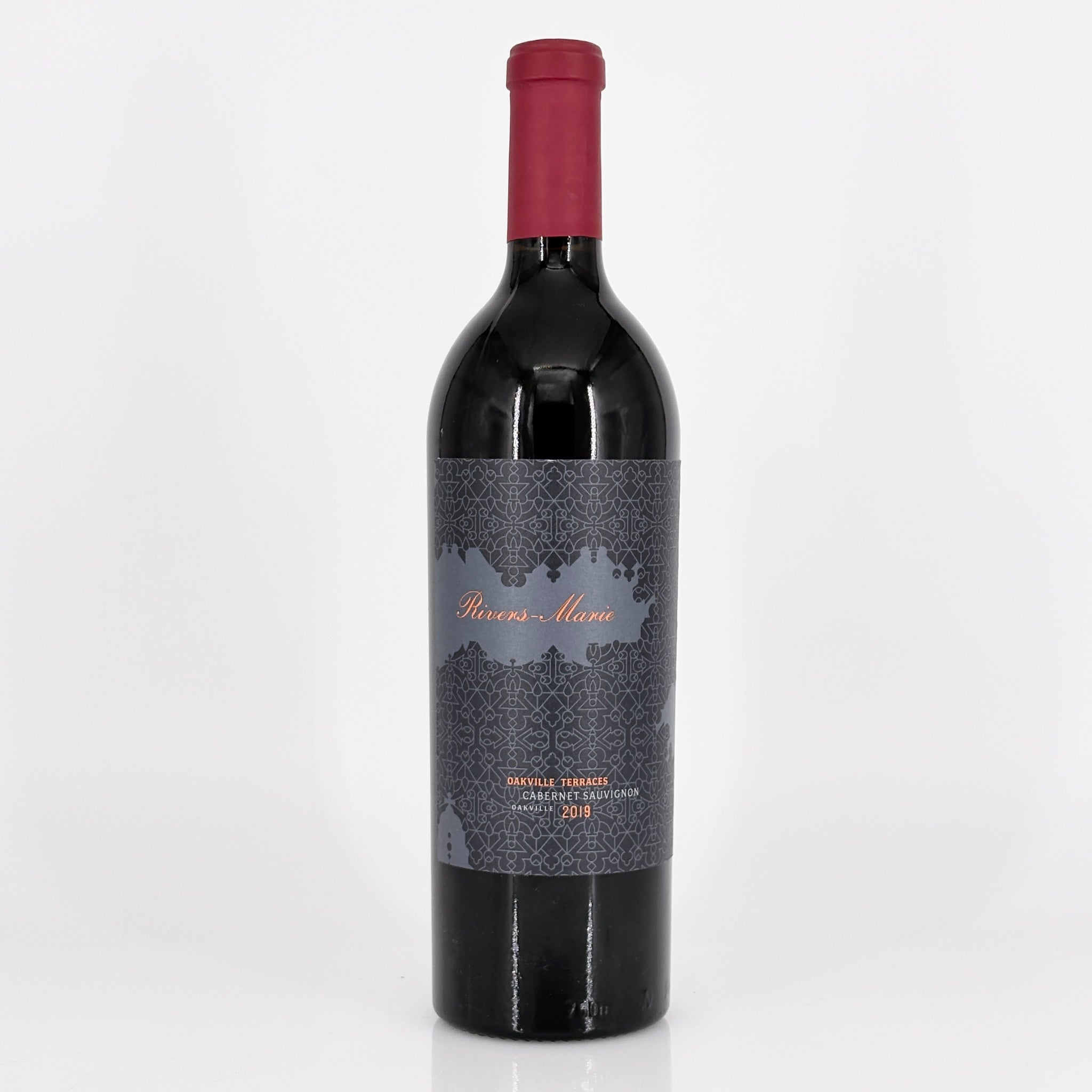 Red wine bottle with a gray label on a white background