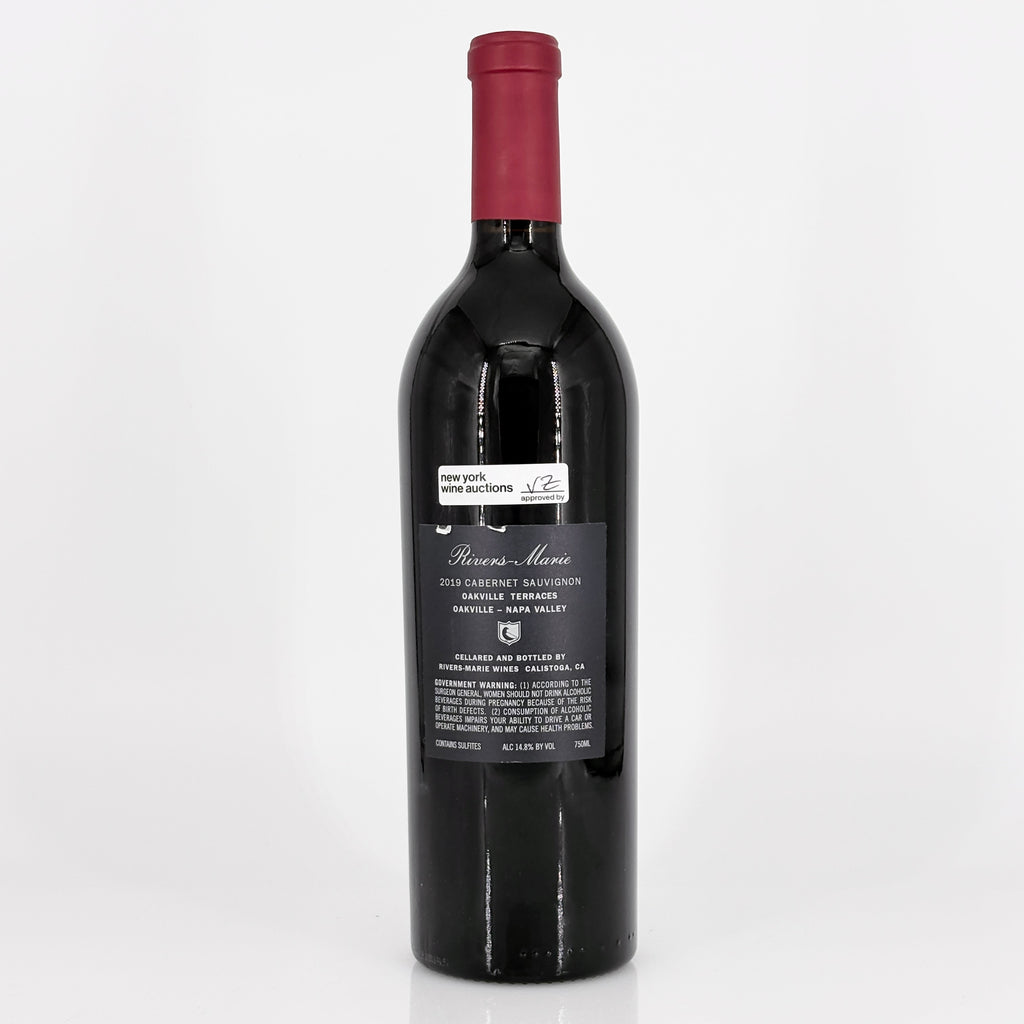Red wine bottle with a visible label on a white background