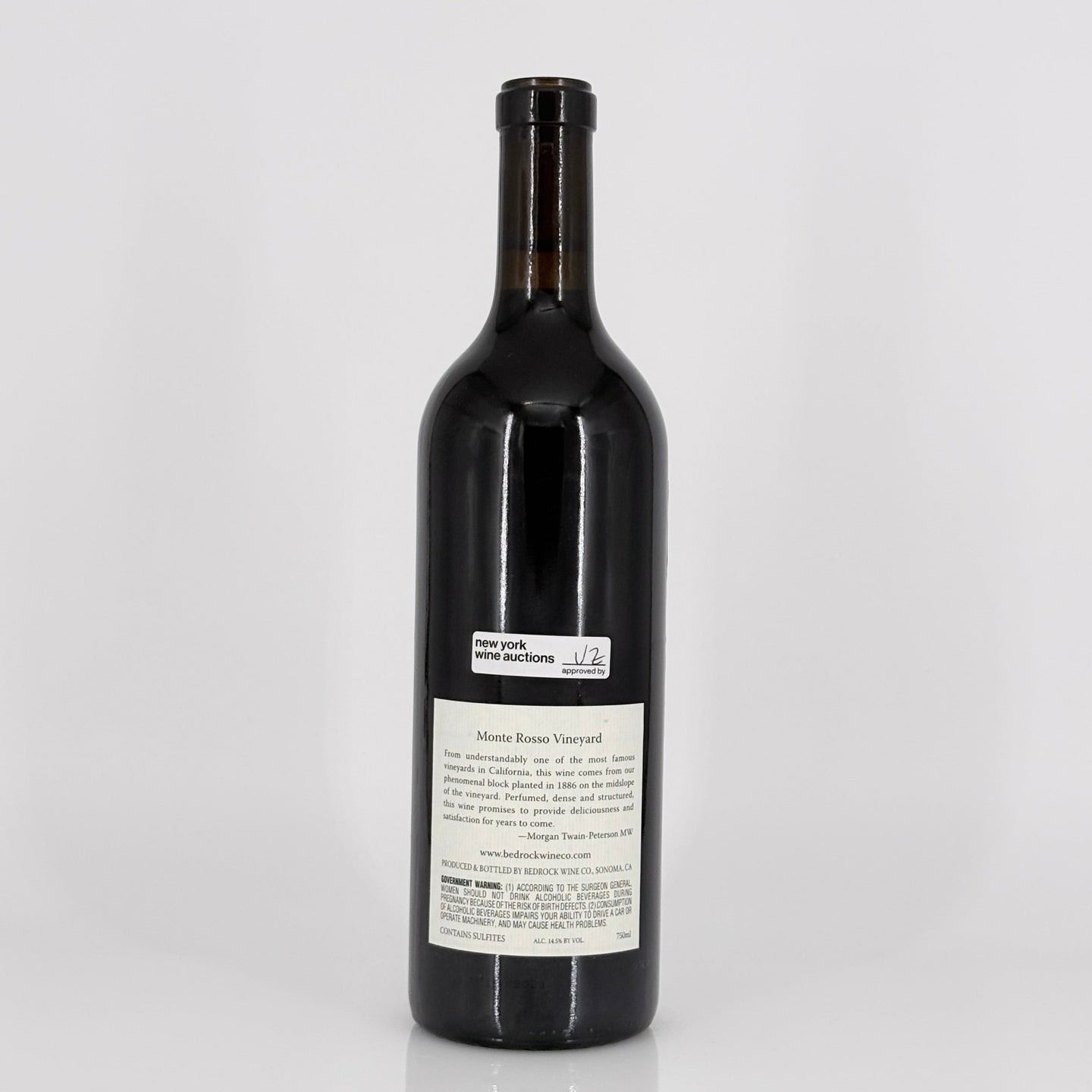 Wine bottle with a label on a white background