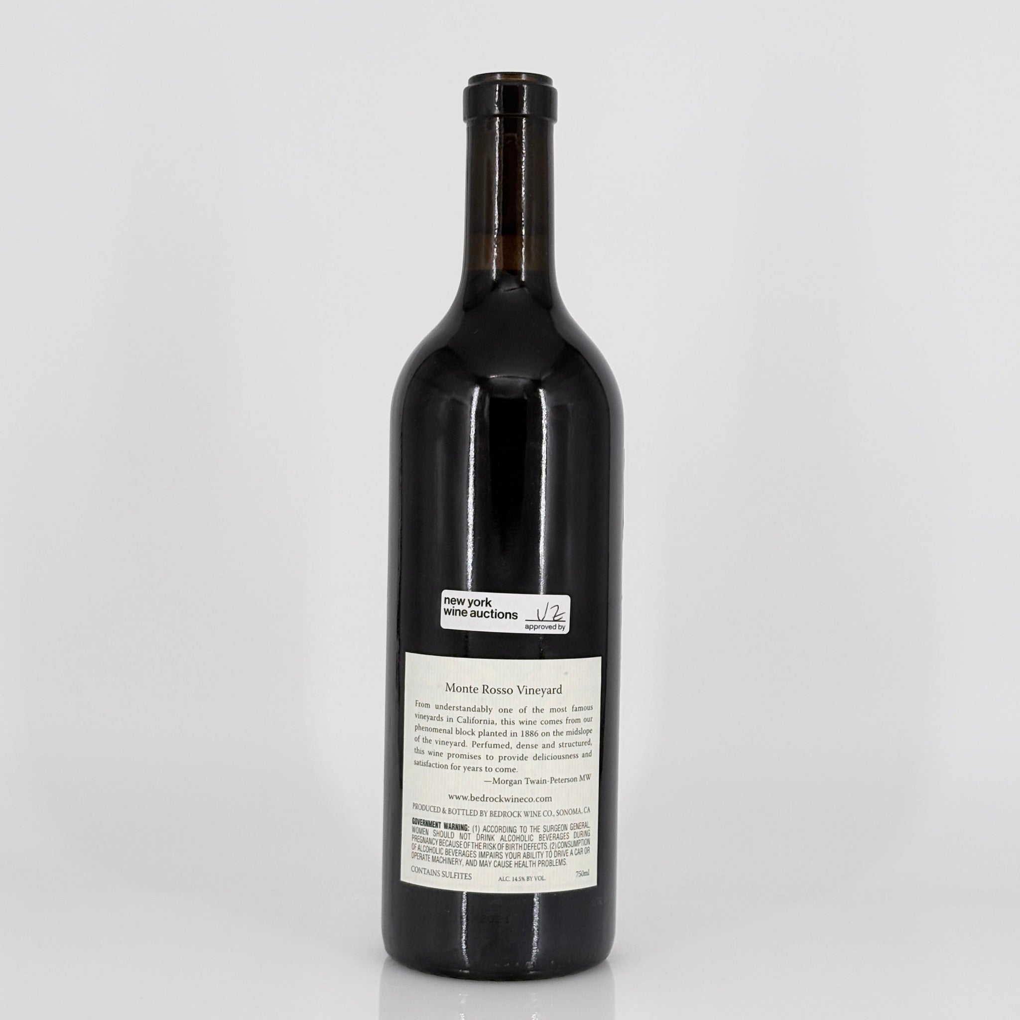 Wine bottle with a label on a white background