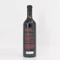 Wine bottle with 'Impulsivo' label on a white background