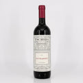 Red wine bottle with 'Tschida' label on a white background