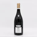 Wine bottle with a visible label on a white background