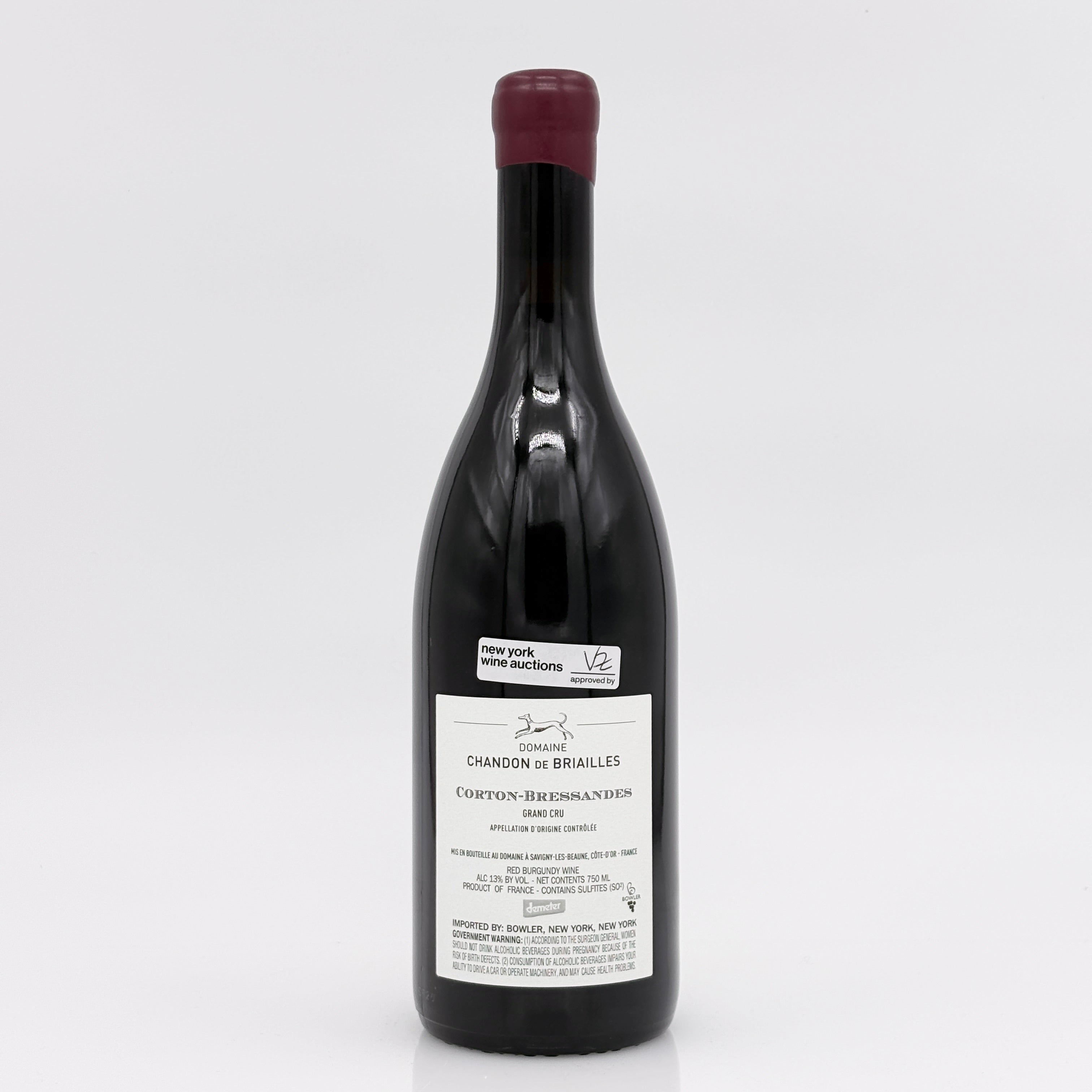 Wine bottle with a label on a white background