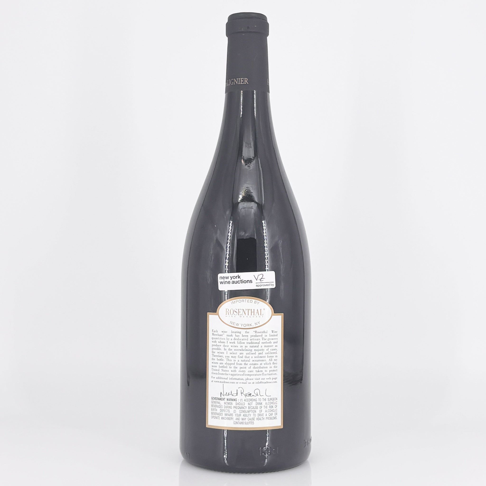 Large wine bottle with a label on a white background
