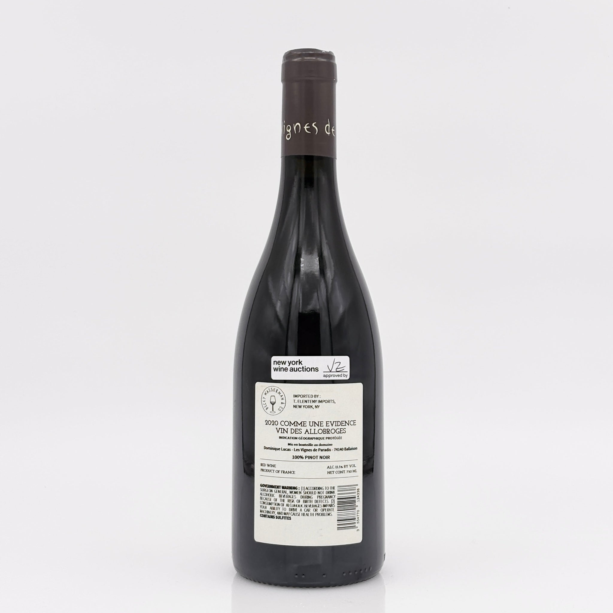 Wine bottle with a label on a white background