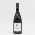 Wine bottle with a label on a white background