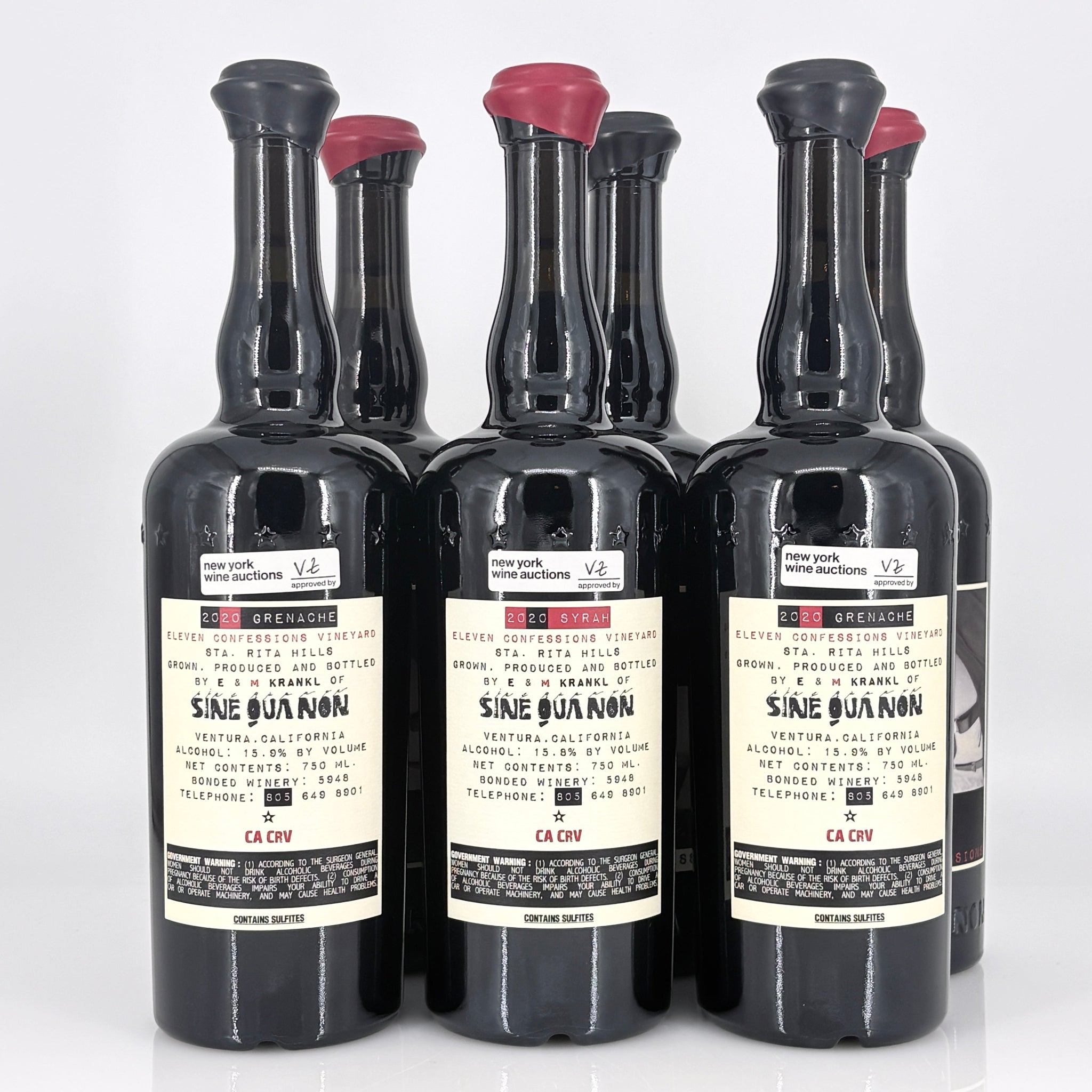 Six bottles of Sine Qua Non wine with labels on a white background