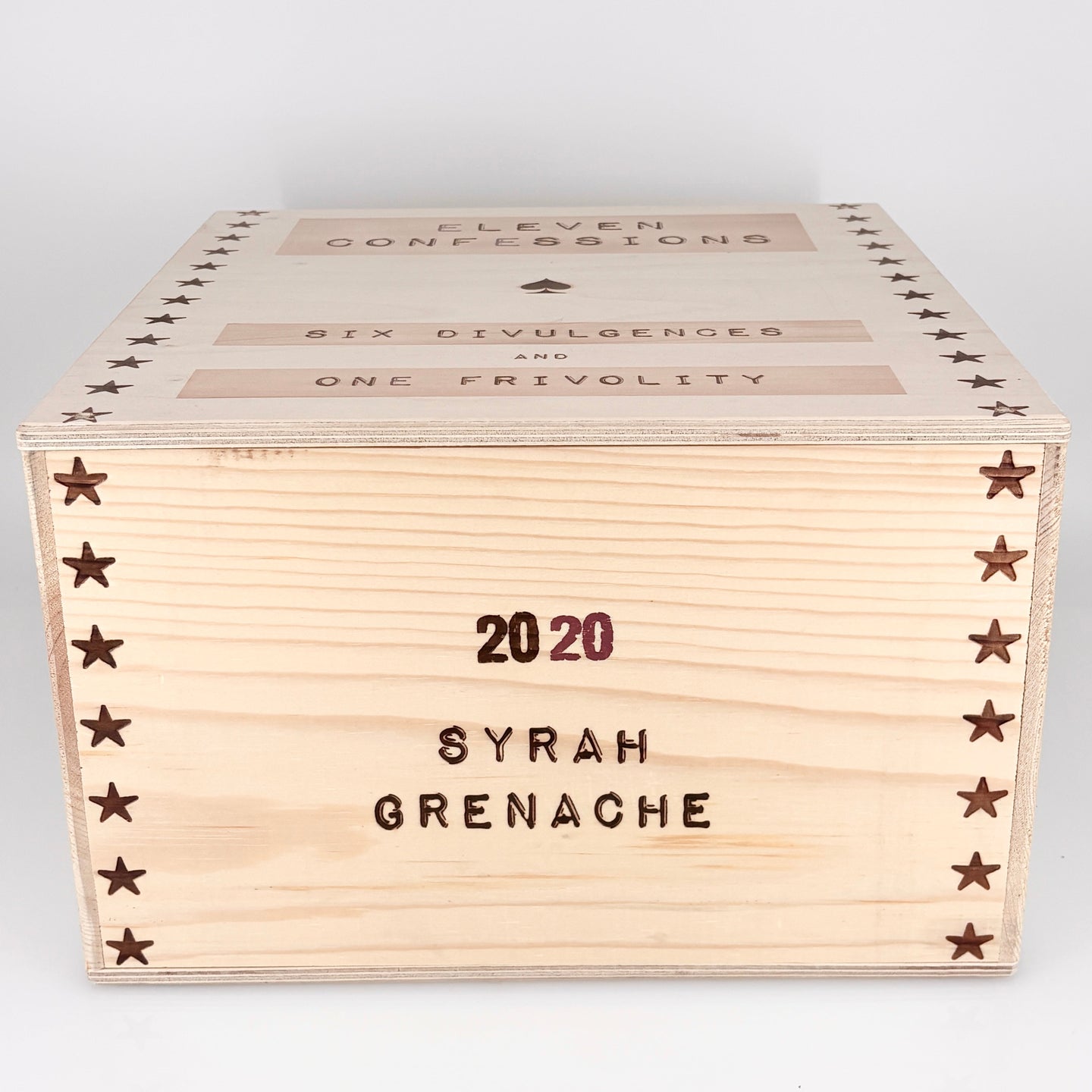Wooden wine box with engraved text on a white background