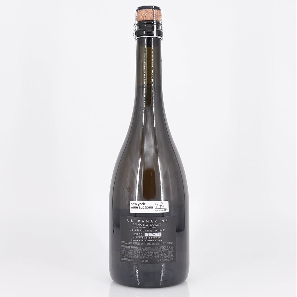 Bottle of Ulteramare with cork on a white background