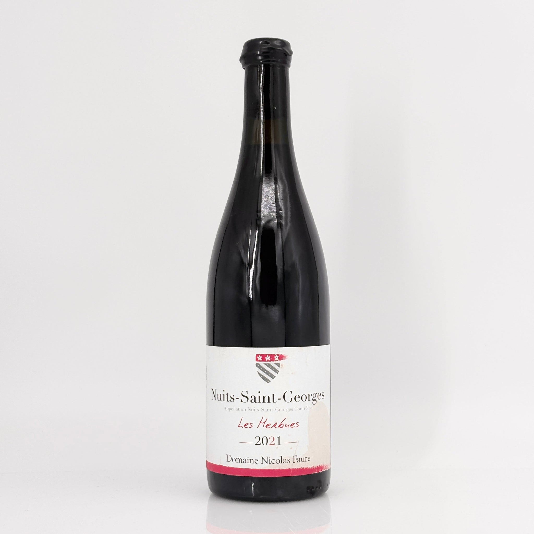 Wine bottle with a label on a white background