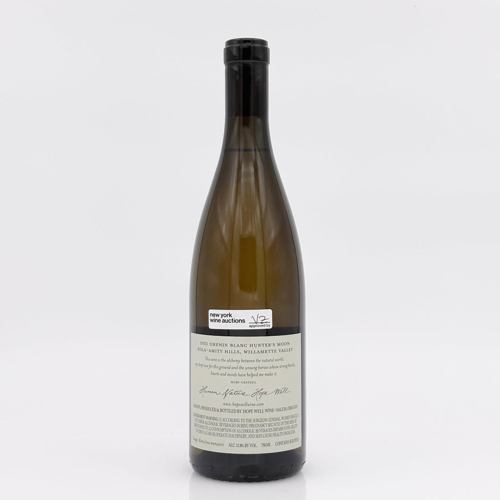 Wine bottle with a label on a white background
