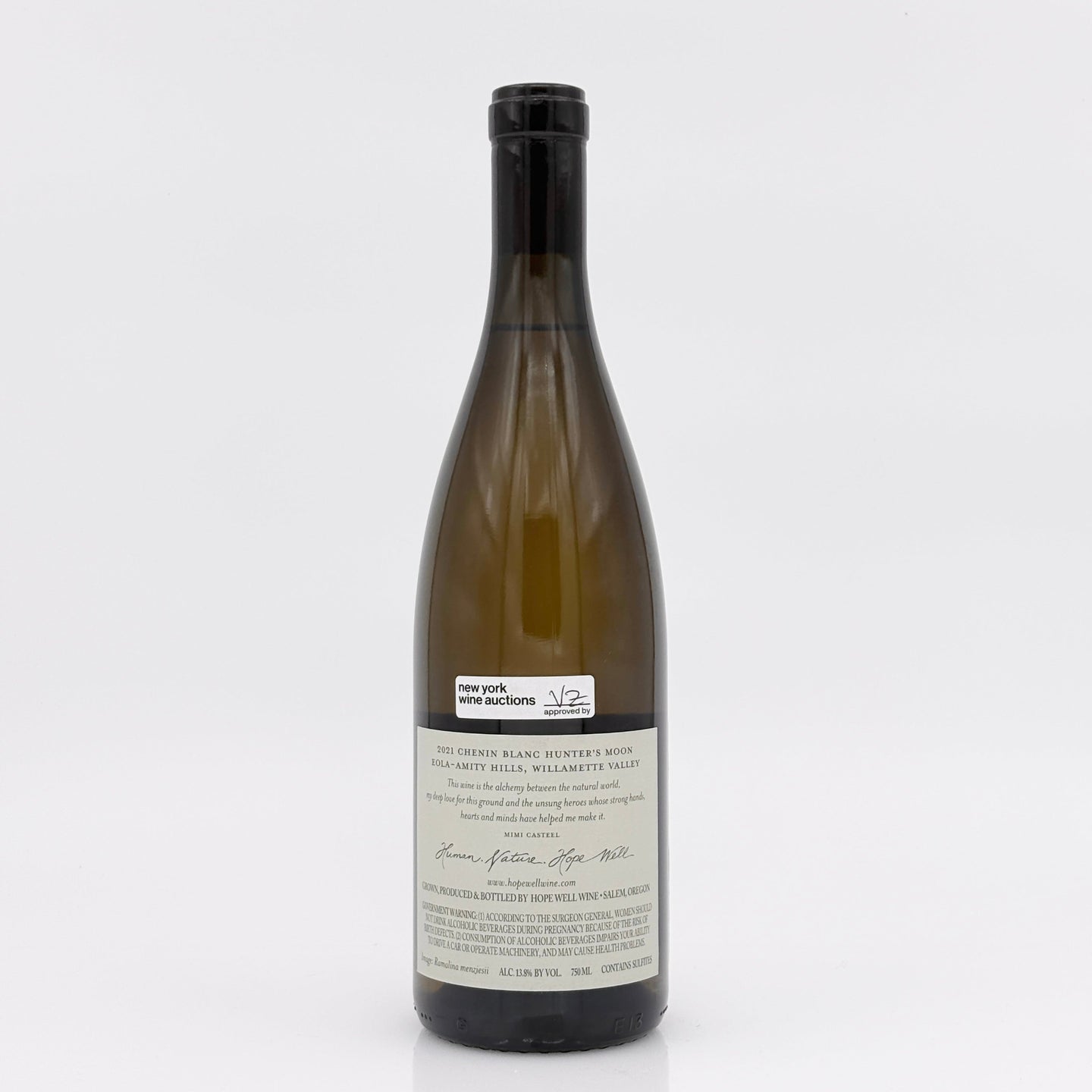 Wine bottle with a label on a white background