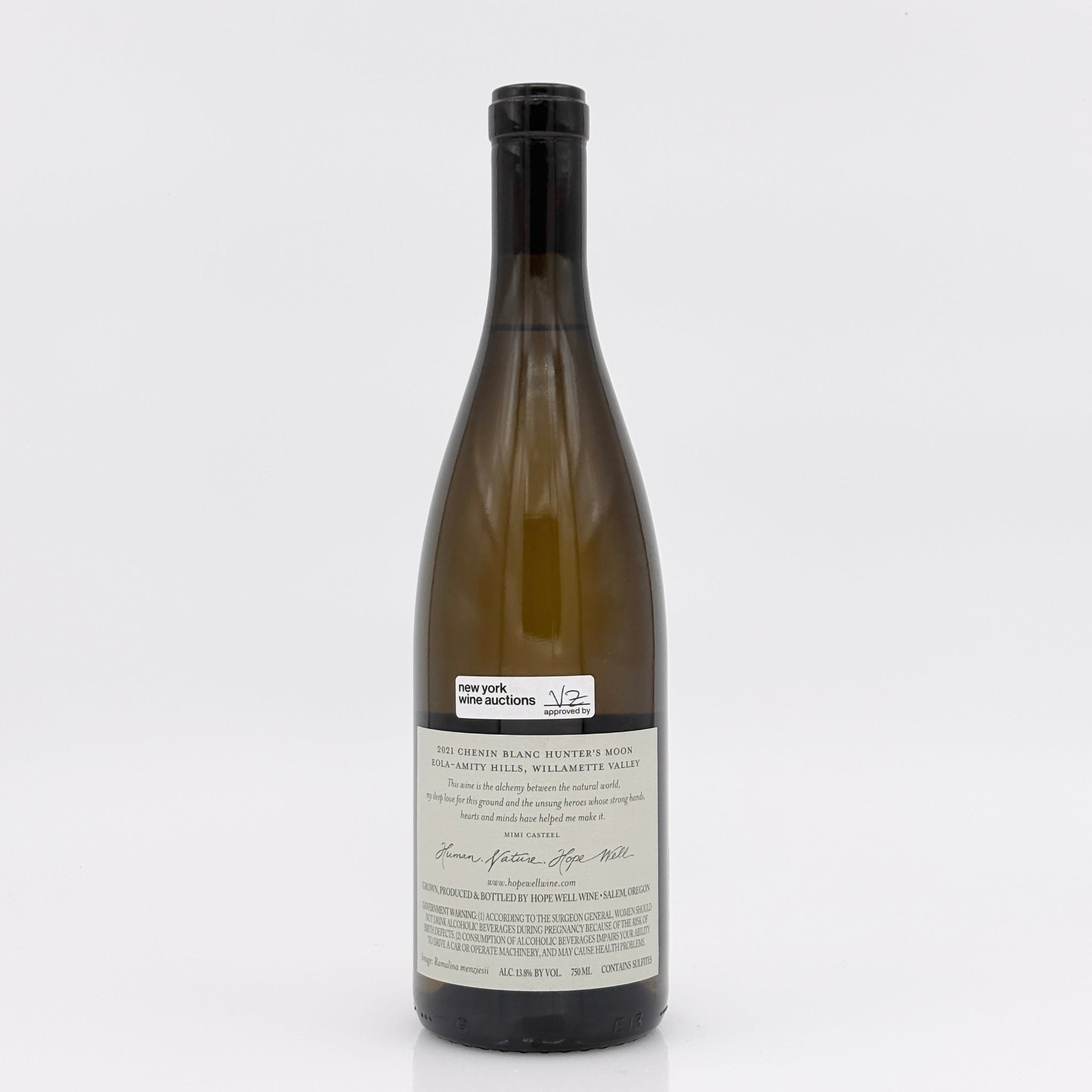 Wine bottle with a label on a white background