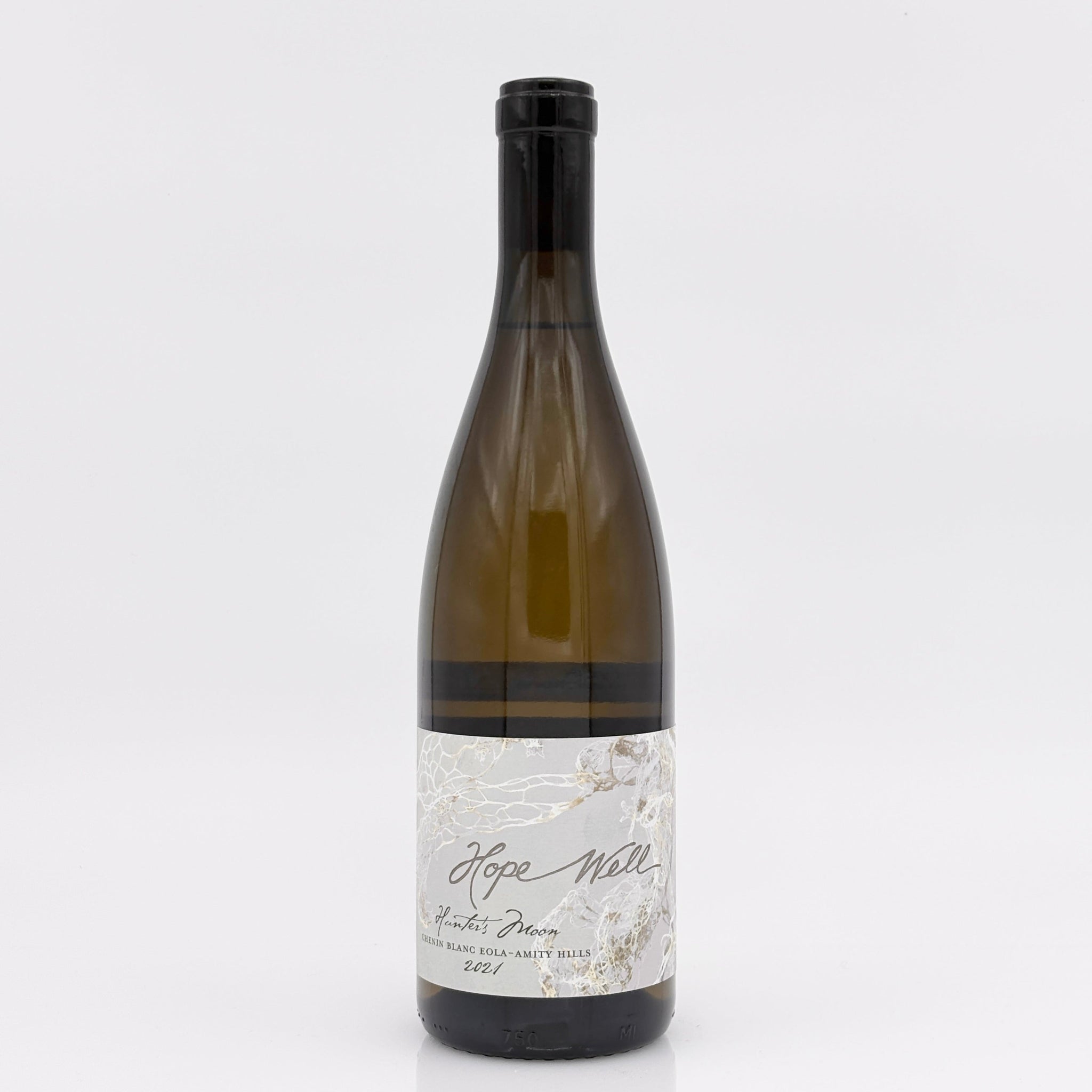 Wine bottle with a label on a white background