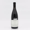 Wine bottle with a label on a white background