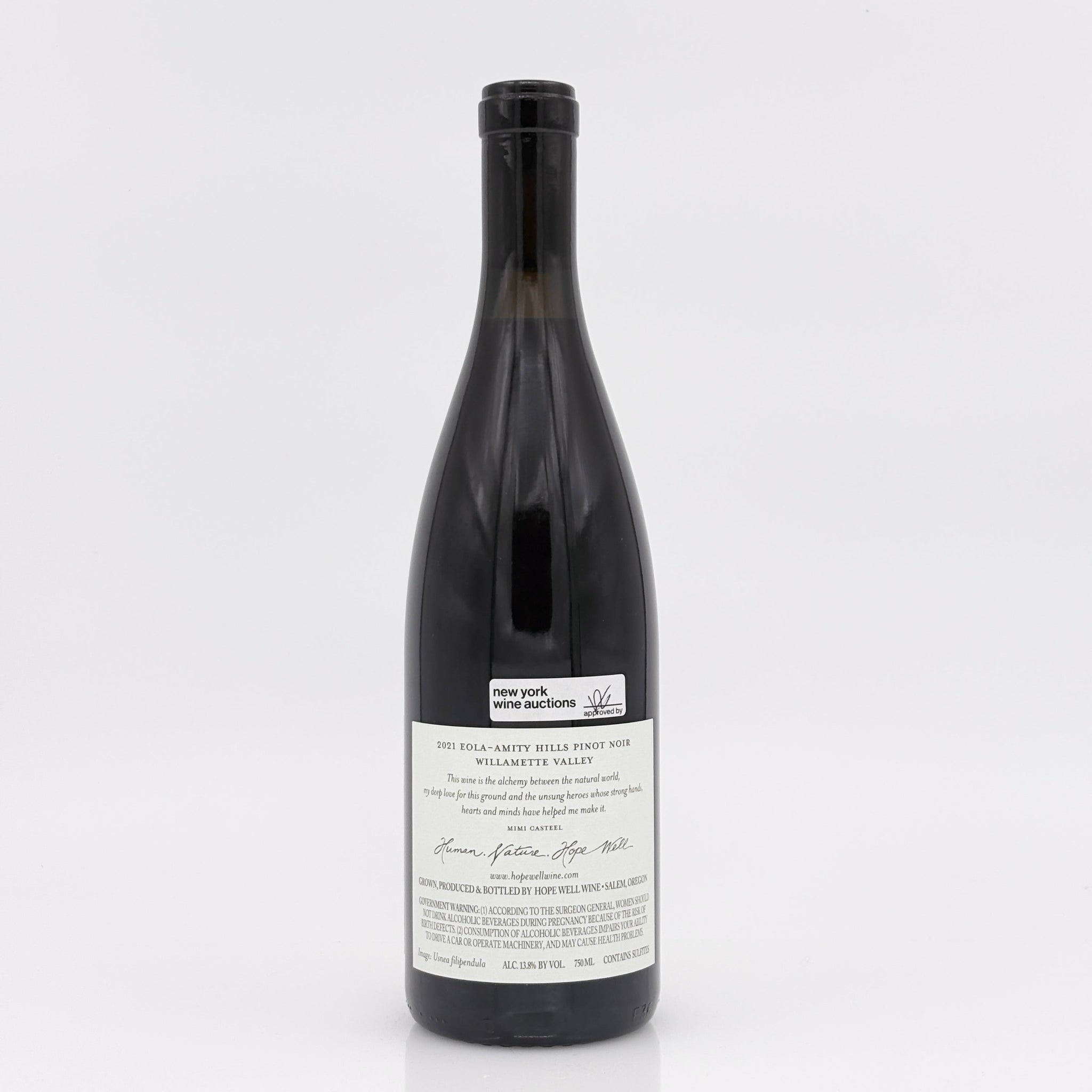 Wine bottle with a label on a white background