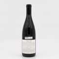 Wine bottle with a label on a white background