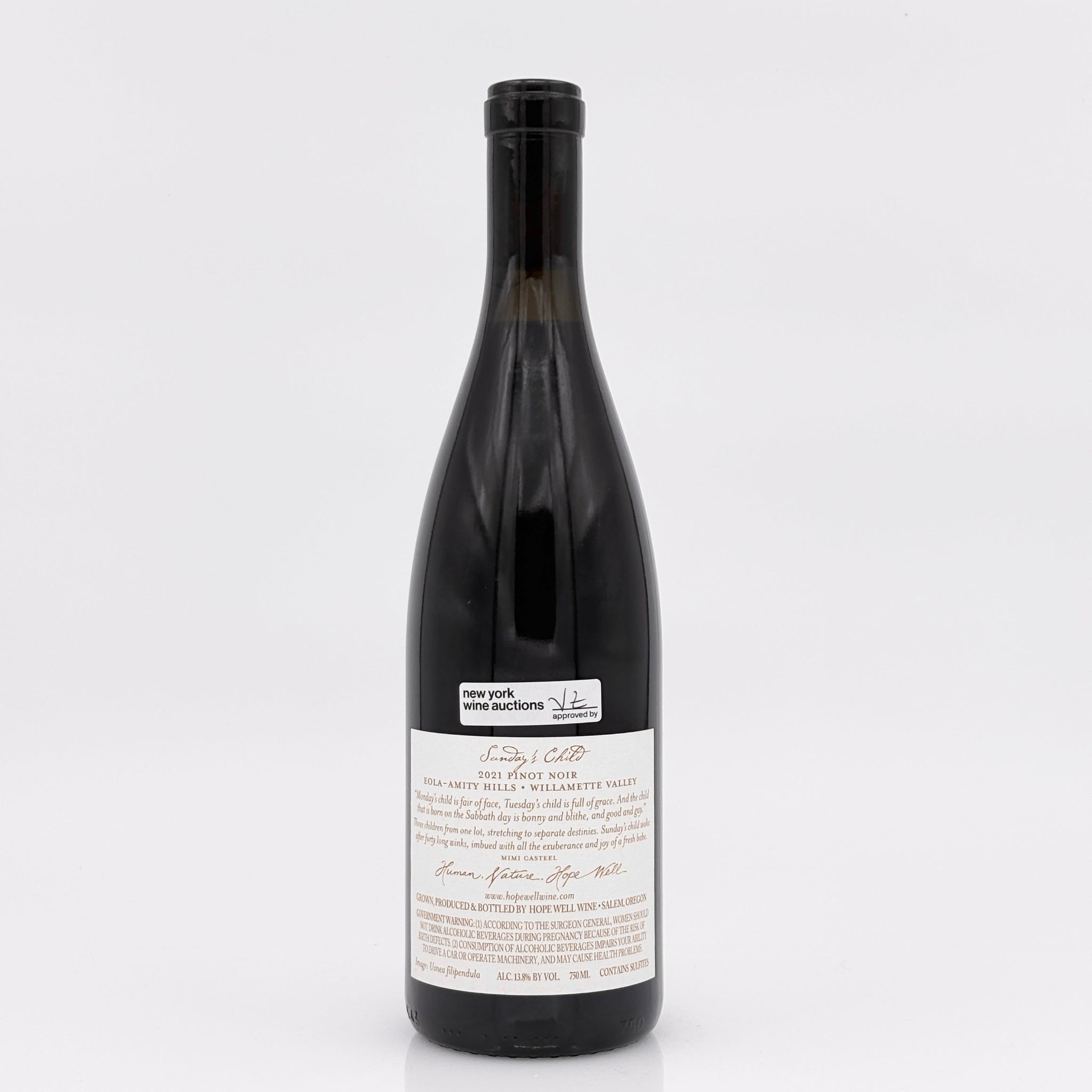 Wine bottle with a label on a white background