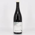 Wine bottle with a label on a white background