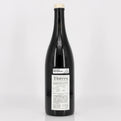 Wine bottle with a label on a white background