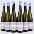 Six bottles of Kilburg wine with purple bottle caps on a white background