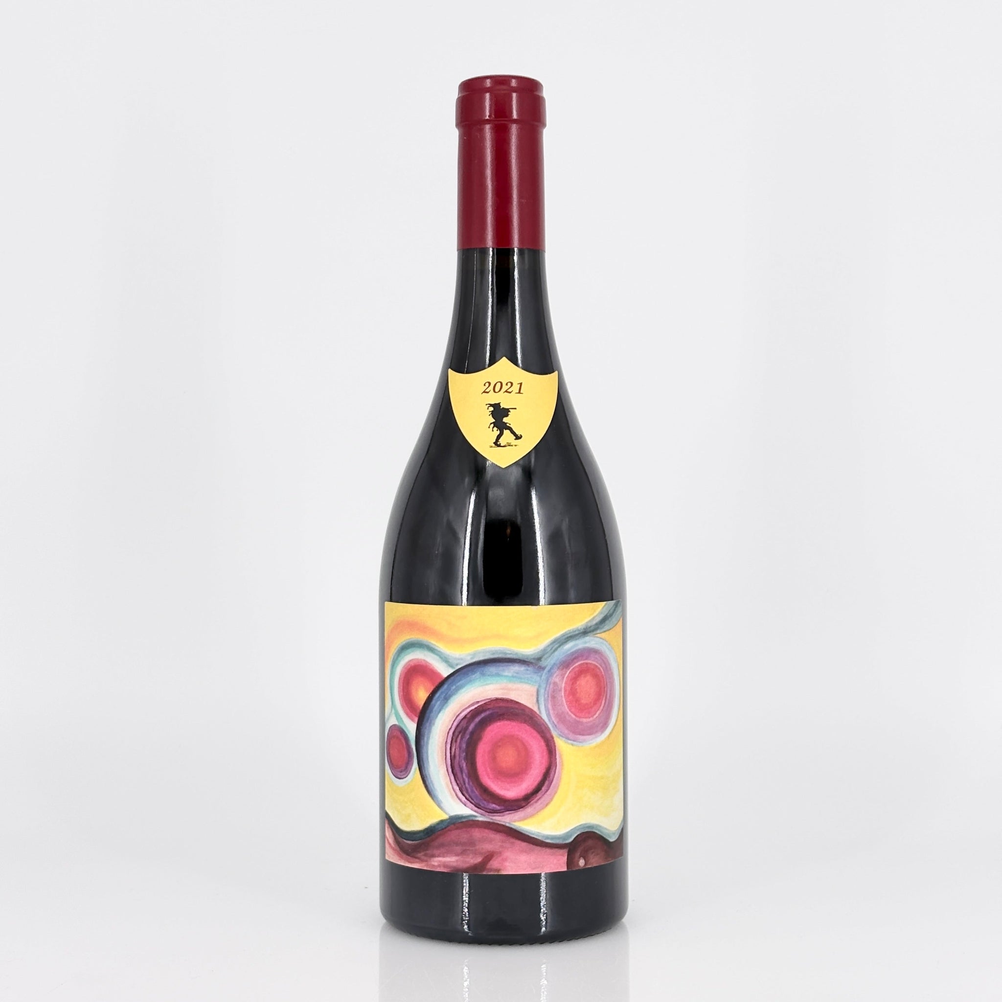 Wine bottle with a colorful label on a white background