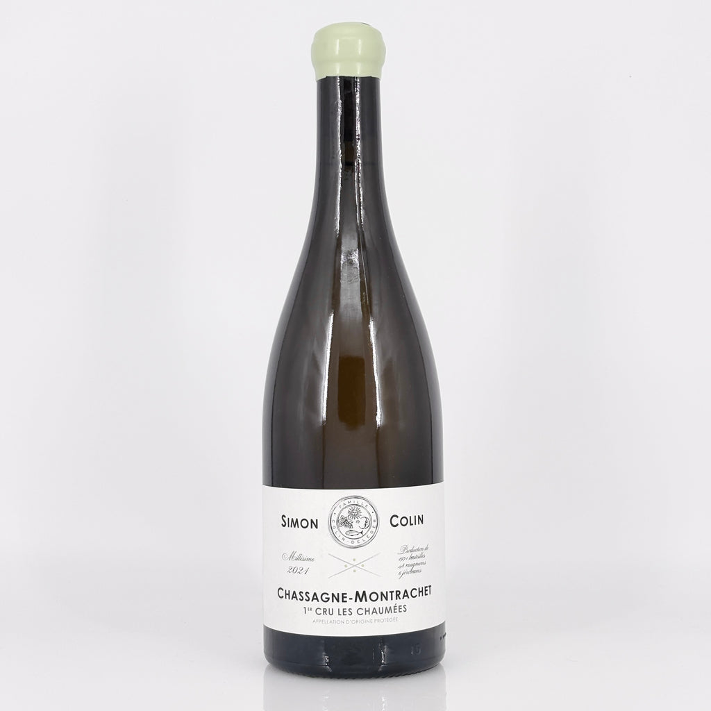 Wine bottle with a white label on a light gray background