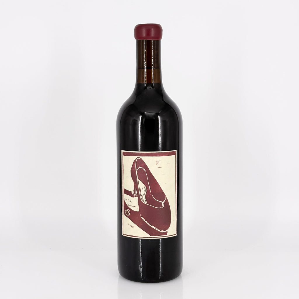 Wine bottle with a label on a white background