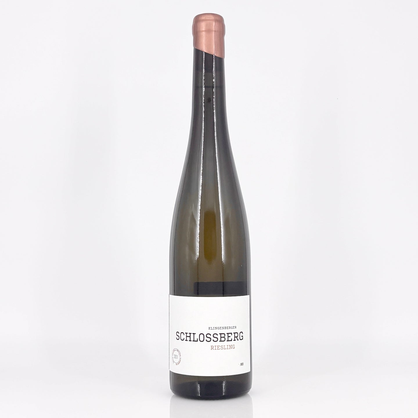 Wine bottle with 'Schlossberg' label on a white background