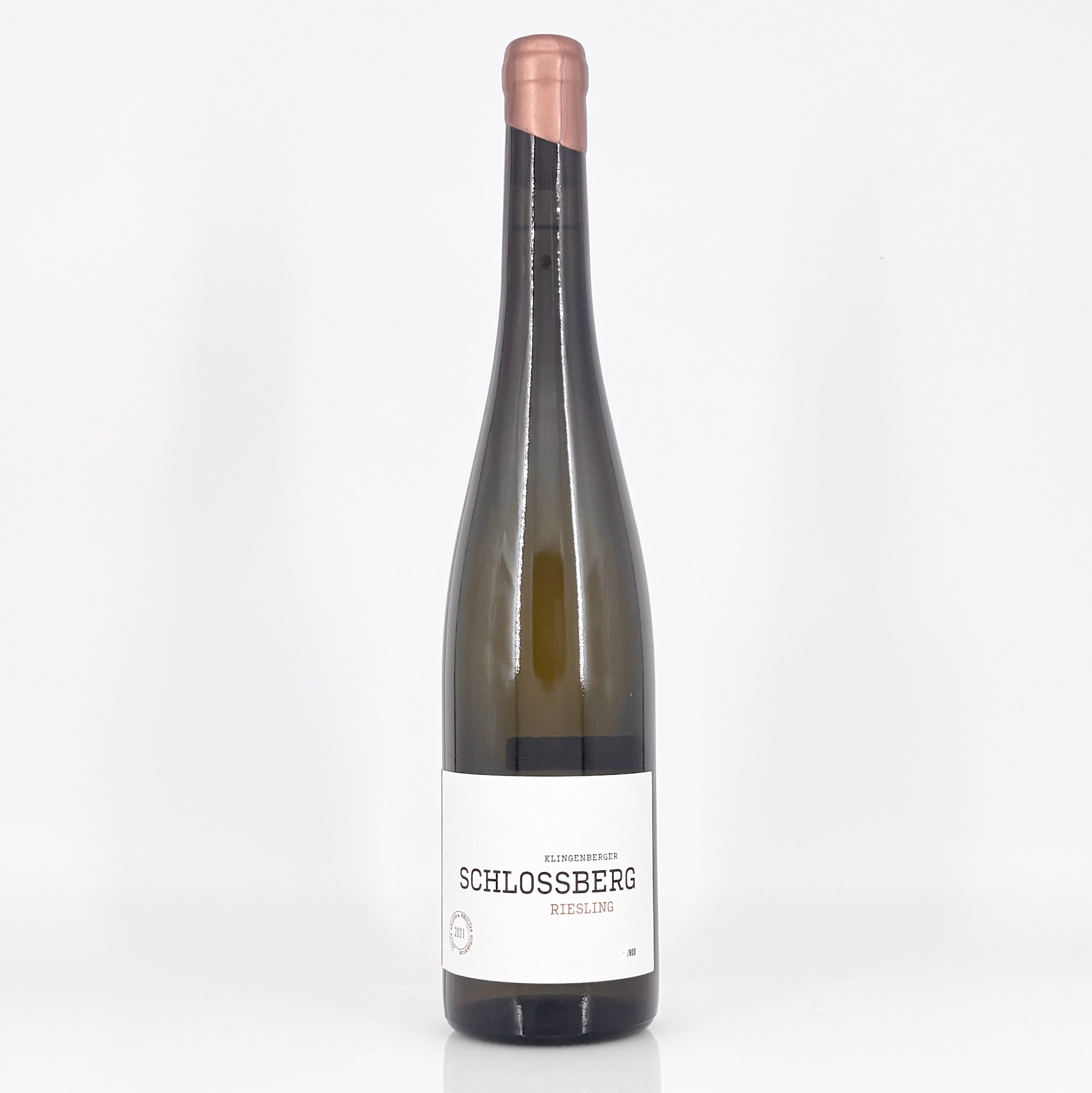 Wine bottle with 'Schlossberg' label on a white background