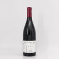 Wine bottle with a label on a white background