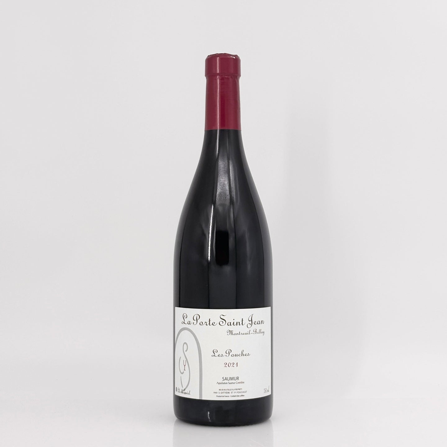 Wine bottle with a label on a white background