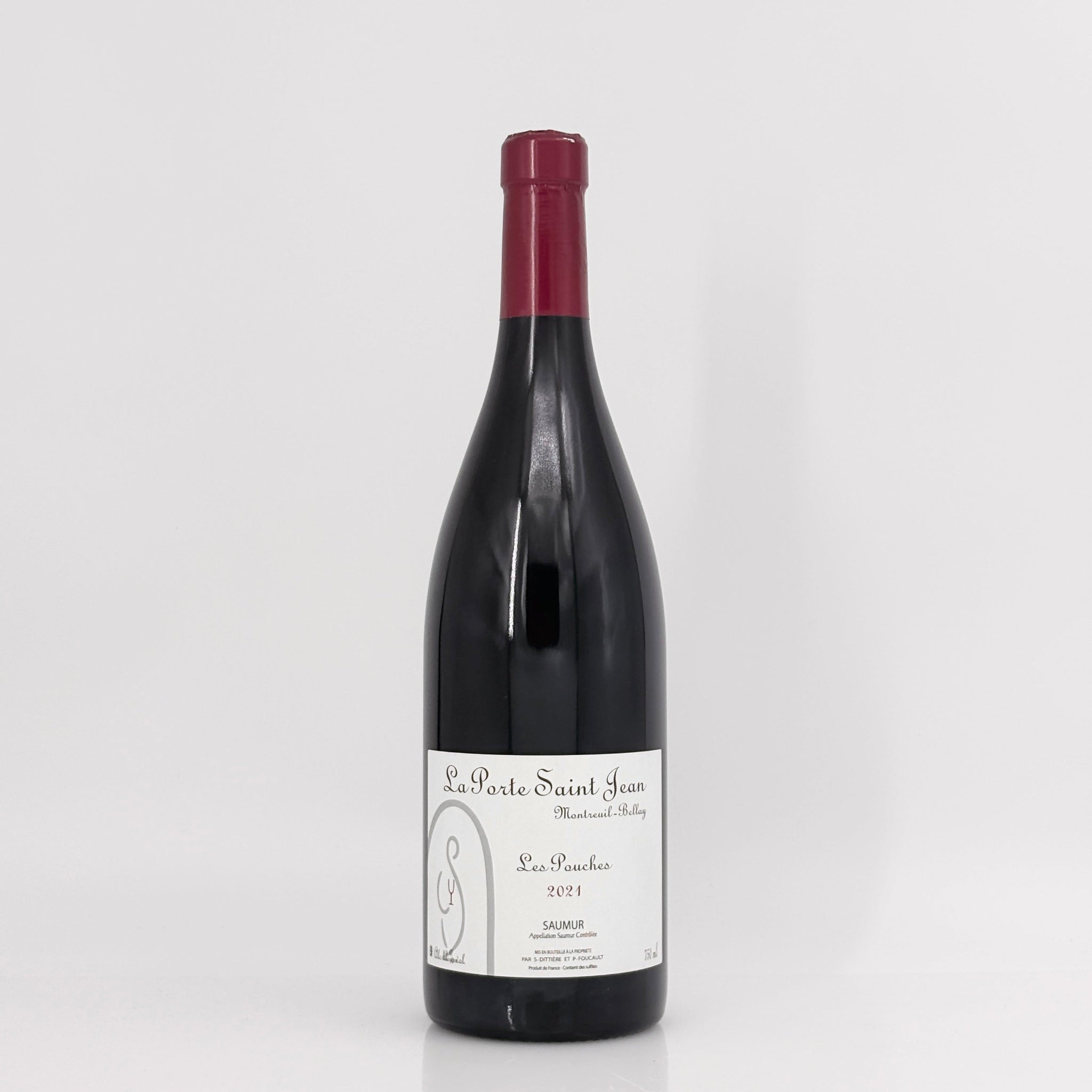 Wine bottle with a label on a white background