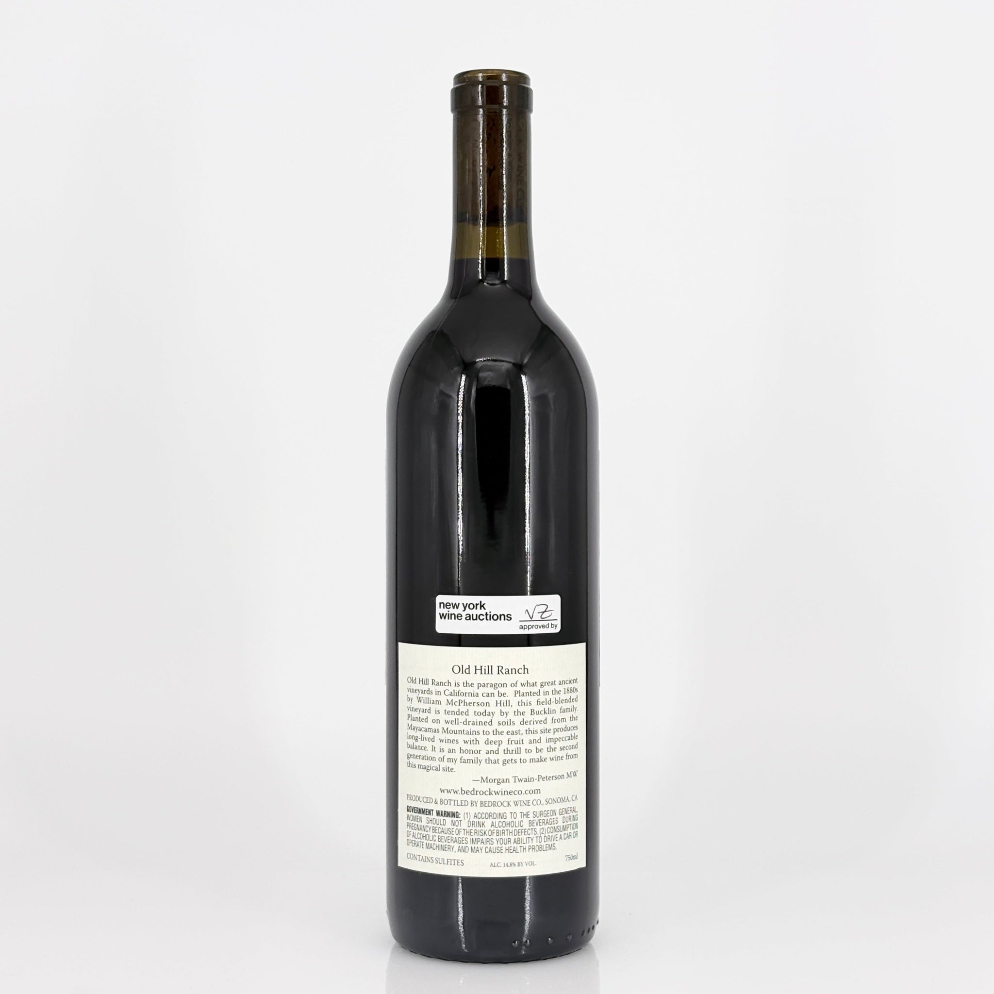 Wine bottle with a label on a white background