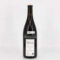Wine bottle with a label on a white background