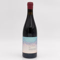 Wine bottle with a label on a white background