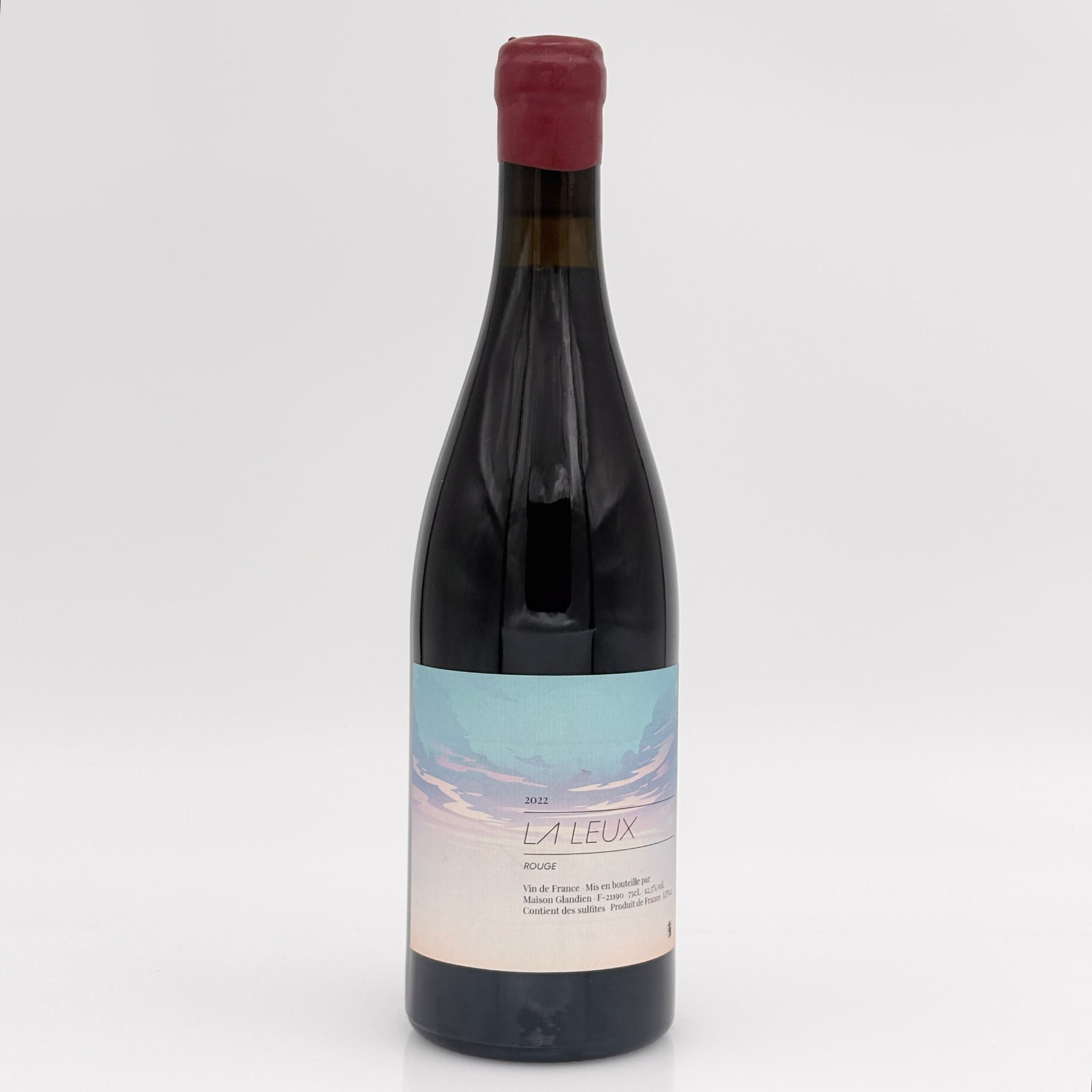 Wine bottle with a label on a white background