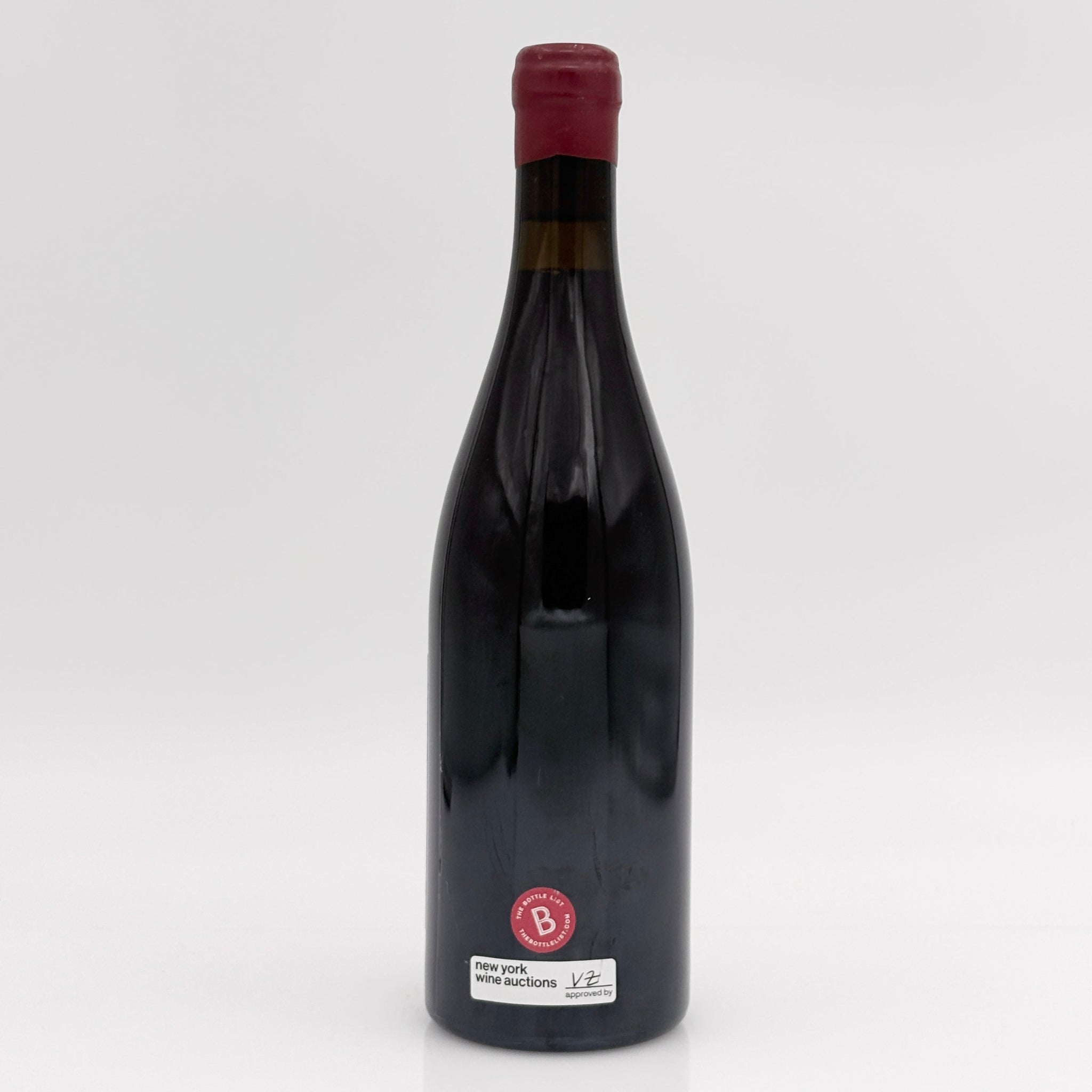 Wine bottle with a visible label on a white background