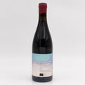 Wine bottle with a label on a white background