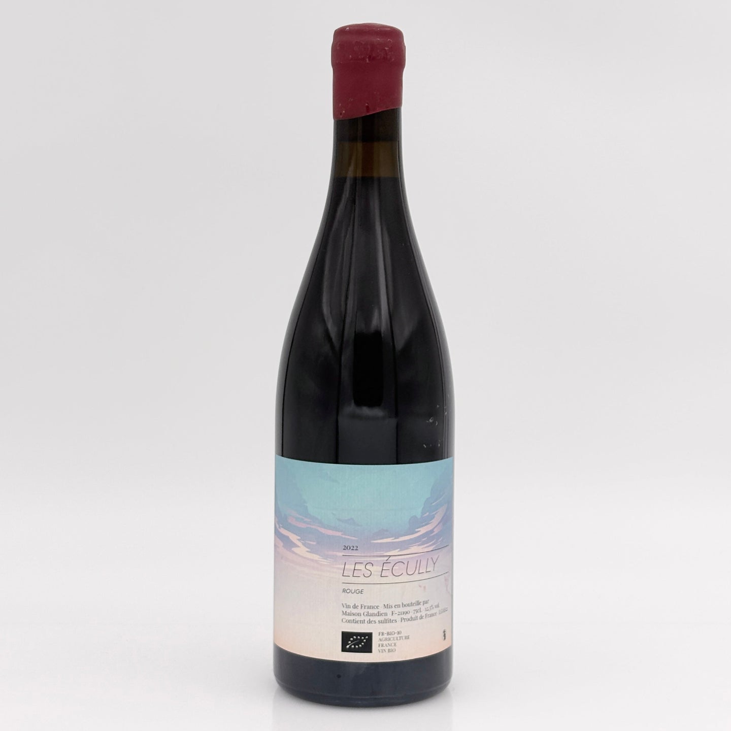 Wine bottle with a label on a white background